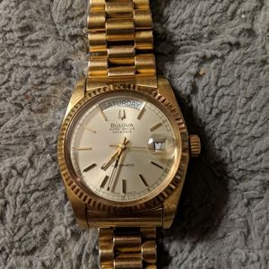 Bulova seville day date automatic gold watch